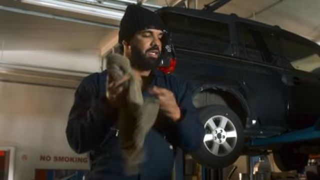 Dark Navy Cov­er­all of Drake in the music video Future - Life Is Good (Official Music Video) ft. Drake