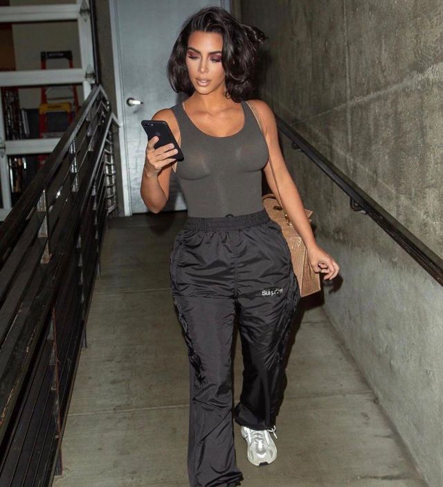 Adidas Originals Yeezy Boost Sneak­ers worn by Kim Kardashian Instagram January 14, 2020