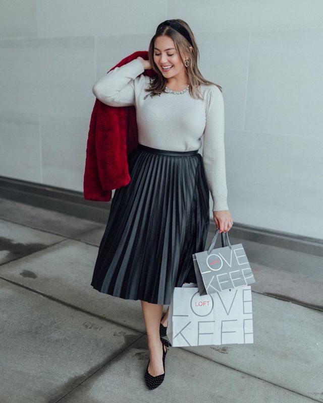 Pleat­ed Faux Leather Skirt of Caralyn Mirand Koch on the Instagram account @caralynmirand