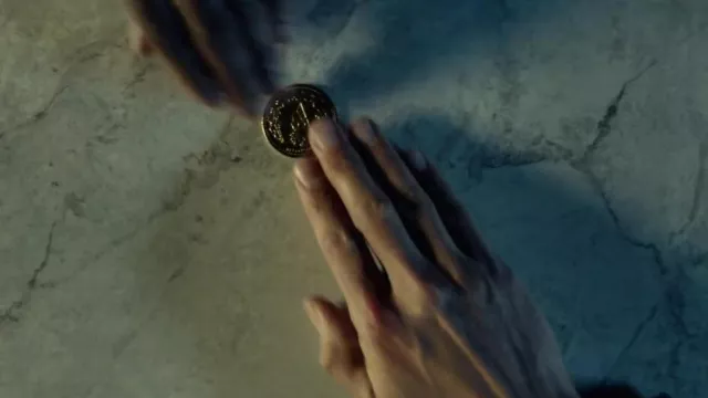 La pièce de monnaie du Continental utilisée par John Wick (Keanu Reeves) dans le film John Wick