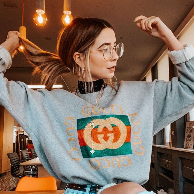 Gucci logo sweater in grey worn by Zoella on her Instagram account @zoesugg