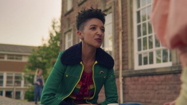 The green jacket, faux fur collar black zip yellow Ola Nyman (Patricia Allison) in Sex Education (S02E02)