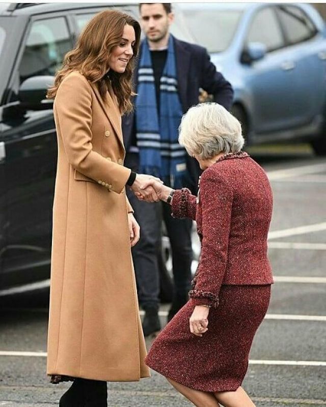 Massiomo Dut­ti But­toned Cash­mere Wool Camel Coat worn by Catherine, Duchess of Cambridge Ely and Careau Children’s Centre January 22, 2020