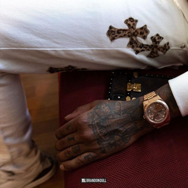 Rolex Day-Date President Yellow Gold 36mm Bezel Engraved Champagne Diamond Dial of Quavo on the Instagram account @quavohuncho