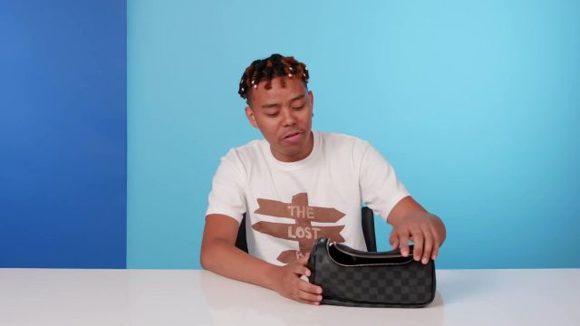Louis Vuitton Toiletry Pouch worn by YBN Cordae in 10 Things YBN Cordae Can't Live Without | GQ