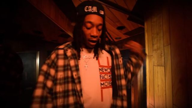 Raf Simons New Order Print White T-Shirt of Wiz Khalifa in the music video Wiz Khalifa - Chappelle's Show feat. AD [Official Music Video]
