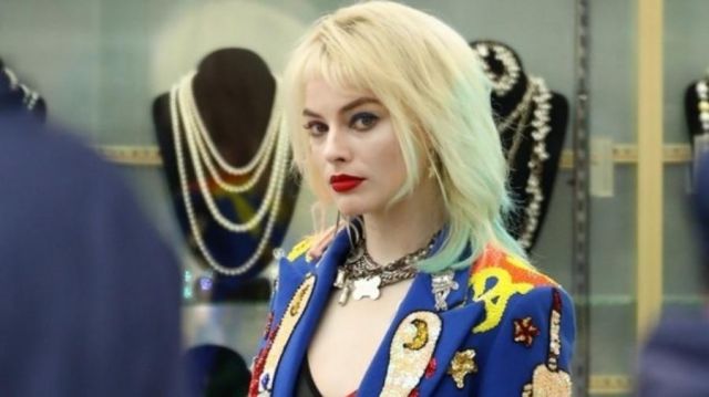 Blue jacket with patches worn by Harley Quinn (Margot Robbie) as seen in Birds of Prey (and the Fantabulous Emancipation of One Harley Quinn)