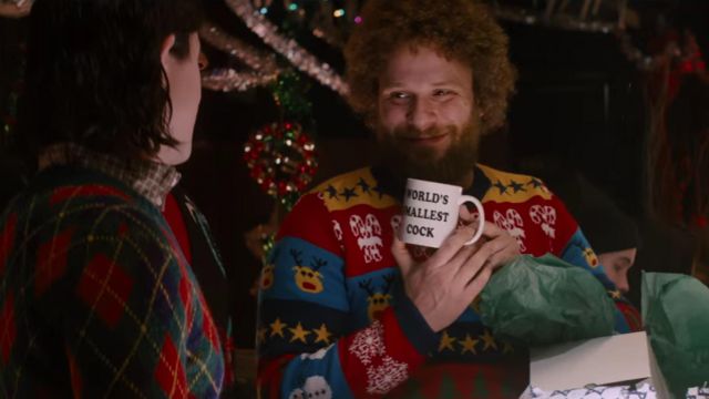 Le pull de Noël Cheesy Christmas de Seth Rogen dans The Night Before