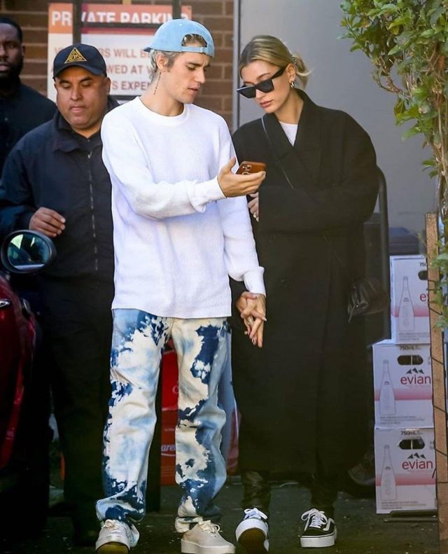 Bottega Veneta Black Small The Pouch Clutch worn by Hailey Baldwin With Justin Bieber February 16, 2020