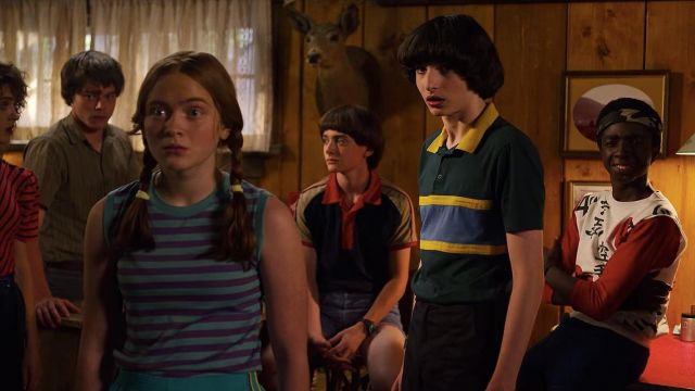 Green blue and yellow polo shirt worn by Mike Wheeler (Finn Wolfhard) as seen in Stranger Things (S03E06)