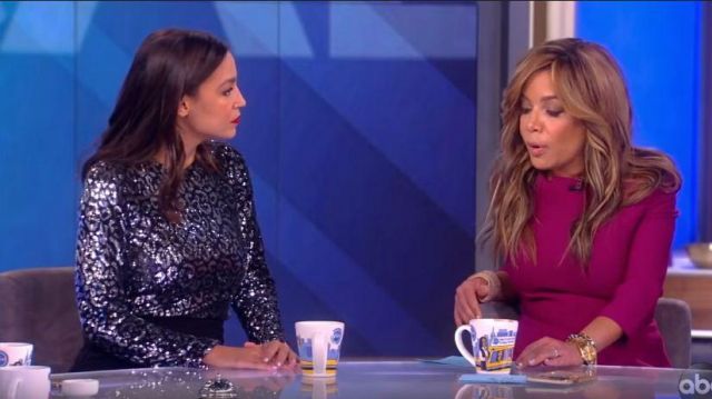 Black halo Lazaro CB Jump­suit worn by Alexandria Ocasio-Cortez on The View February 19, 2020