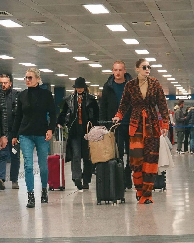 Louis Vuitton Horizon Jacquard Suitcase worn by  Bella Hadid Milan Linate Airport February 23, 2020