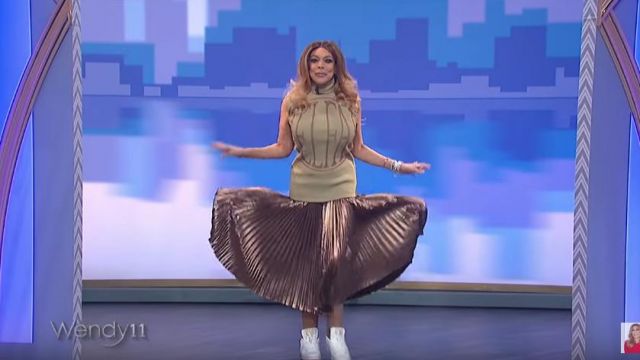 Telfar Lo­go Print Hal­ter­neck Top worn by Wendy Williams on The Wendy Williams Show February 24, 2020