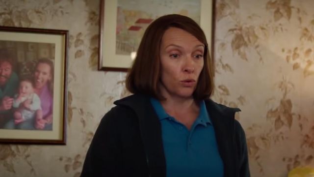 Blue polo shirt worn by Jan Vokes (Toni Collette) in Dream Horse