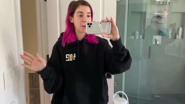 Black Pullover Hoodie worn by Gabbie Hanna in the YouTube video I Drank a Gallon of Water a Day for a Month