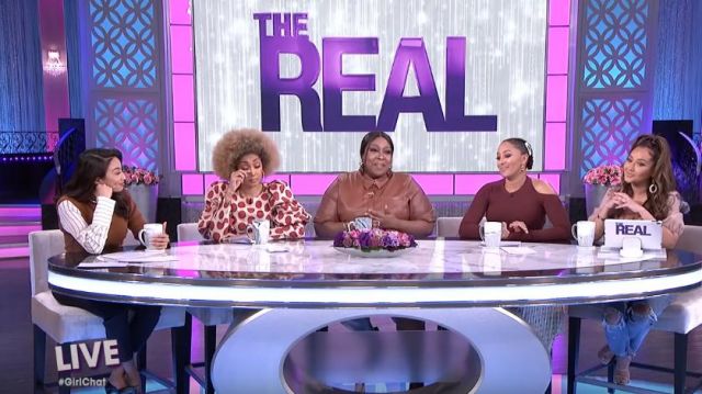 Aqua But­ton De­tail Puff-Sleeve Top worn by Adrienne Bailon on The Real March 4, 2020