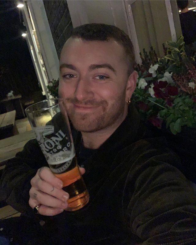 Chunky gold hoop earrings of Sam Smith on the Instagram account @samsmith