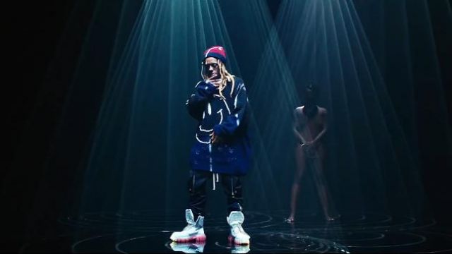 Raf simons Smi­ley Face-em­broi­dered Wool Sweater worn by Lil Wayne in the music video Lil Wayne - Mama Mia (Official Video)