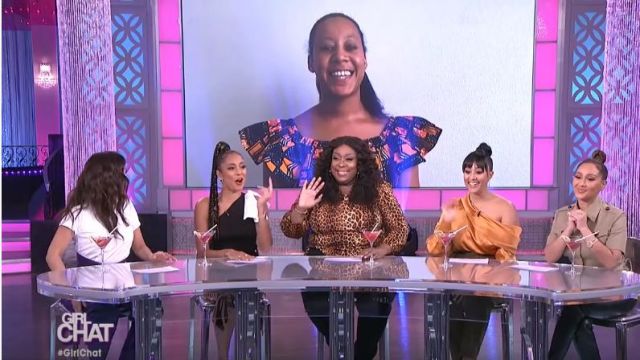 Alix nyc Cather­ine Blouse en Saf­fron worn by Tamera Mowry on The Real March 27, 2020