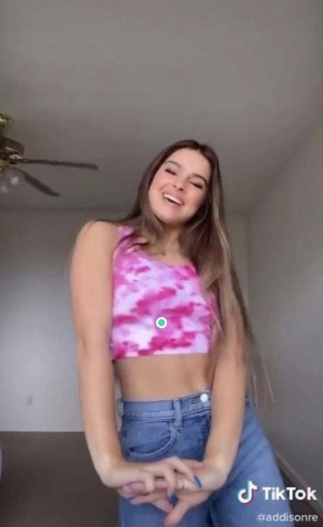 The Pink Tank Top With White Spots Worn By Addisone Rae On Tik Tok Spotern