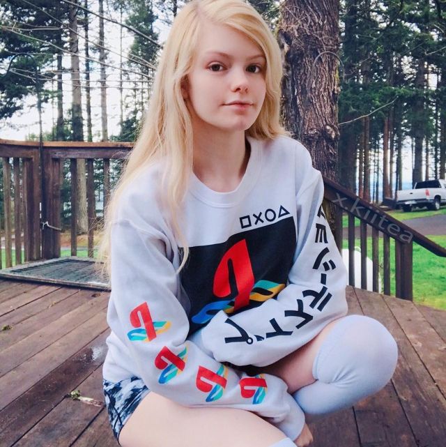Forever 21 Long sleeve PlayStation white crewneck worn by x.kiitea on her Instagram account @x.kiitea