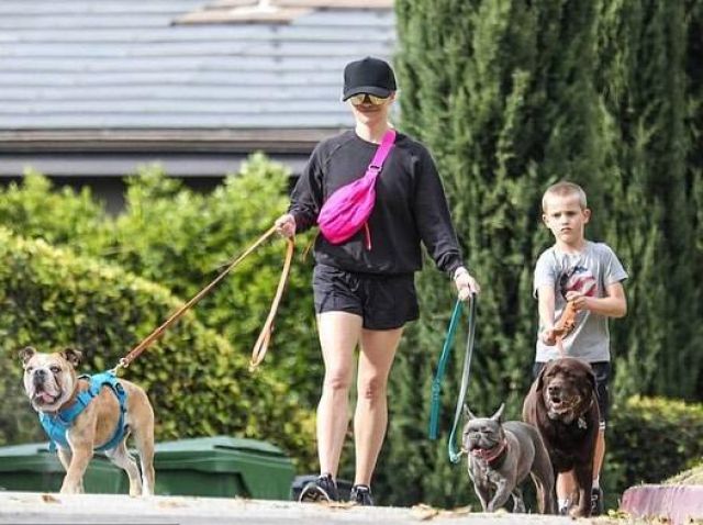 Hoka One One Clifton Sneakers worn by Reese Witherspoon Walking Her Dogs April 6, 2020