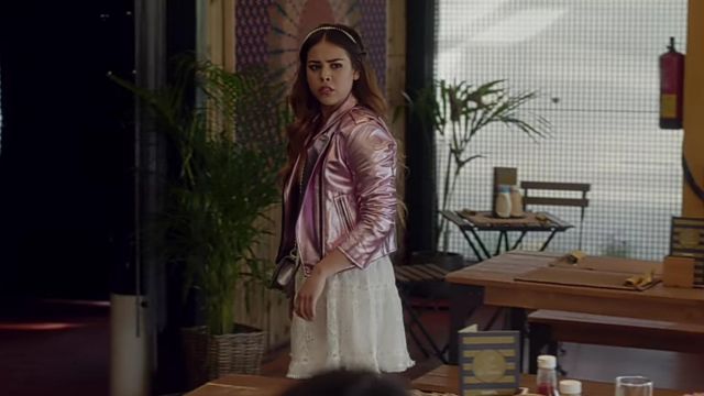 The jacket metallic pink with registration PUMP in the back of the range by Lu (Danna Paola) in the series Elite (Season 1 Episode 8)