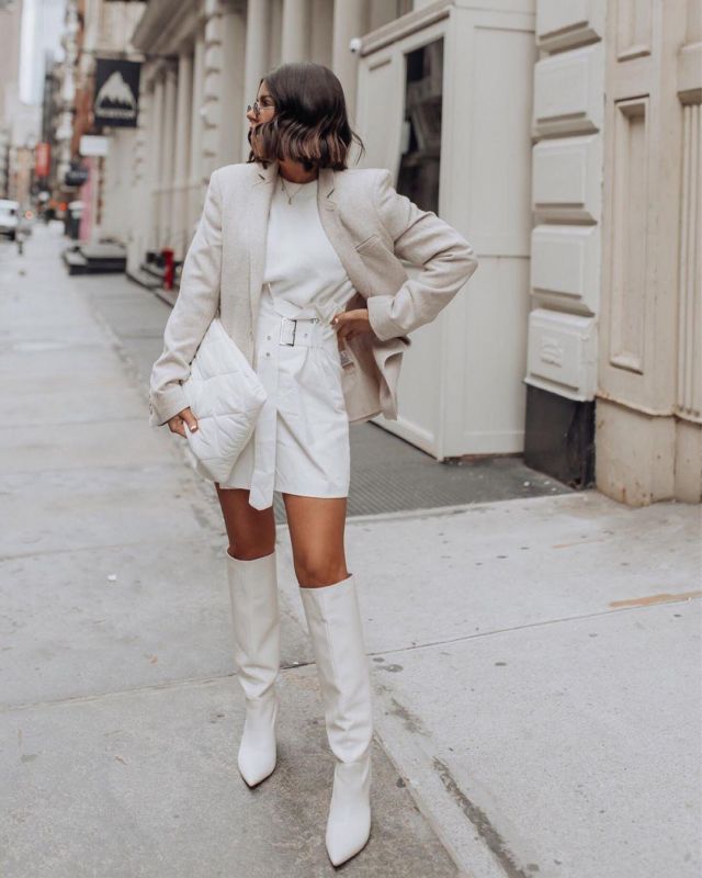 Chandail Blanc de Tiffany Jais sur l'Instagram account @flauntandcenter