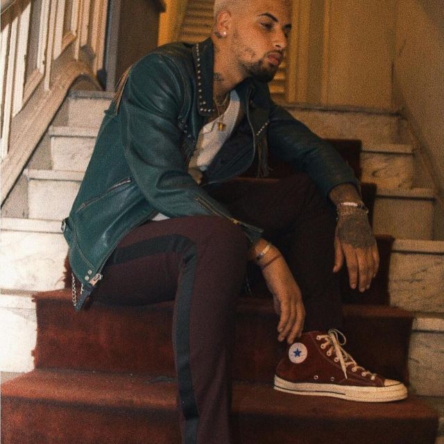 The pair of Converse All Star red bordeaux range by Amir Obè on his account Instagram @amirobe 