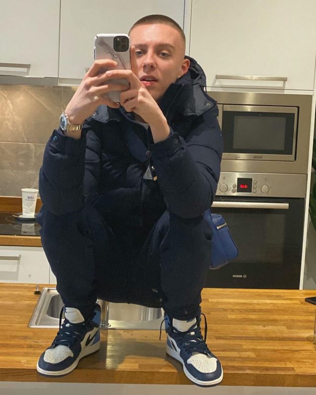 Jordan 1 Retro High Obsidian UNC worn by Aitch on the account Instagram of @aitch