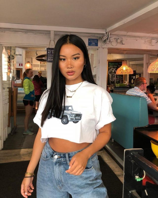 Pretty Little Thing White Wag­on Print­ed Crop T Shirt of Helena on her Instagram account