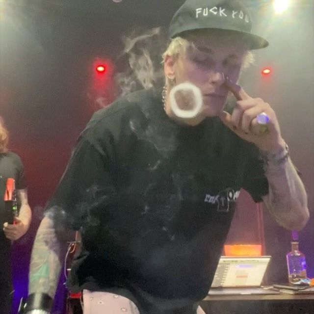 The tracksuit pants pink Bandana Reconstructed Amiri worn by Machine Gun Kelly on his account Instagram @machinegunkelly