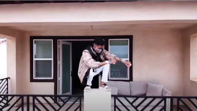 Burberry Beige Check Reg­is Sneak­ers worn by Blueface in his Vibes (Official Music Video)