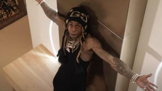Gucci Black & Gold Knit GG Pom­pom Beanie worn by Lil Wayne in his Piano Trap & Not Me (Official Music Video)