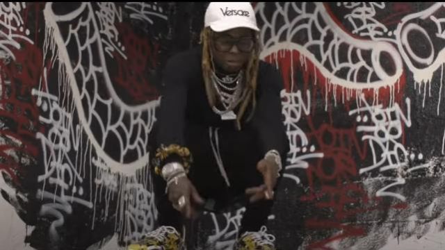 Versace Vin­tage Lo­go Cap in white worn by Lil Wayne in his Piano Trap & Not Me (Official Music Video)