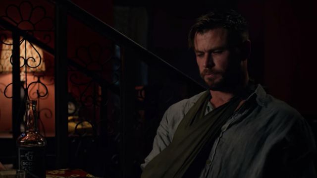 Buttoned-up collared shirt worn by Tyler Rake (Chris Hemsworth) in Extraction
