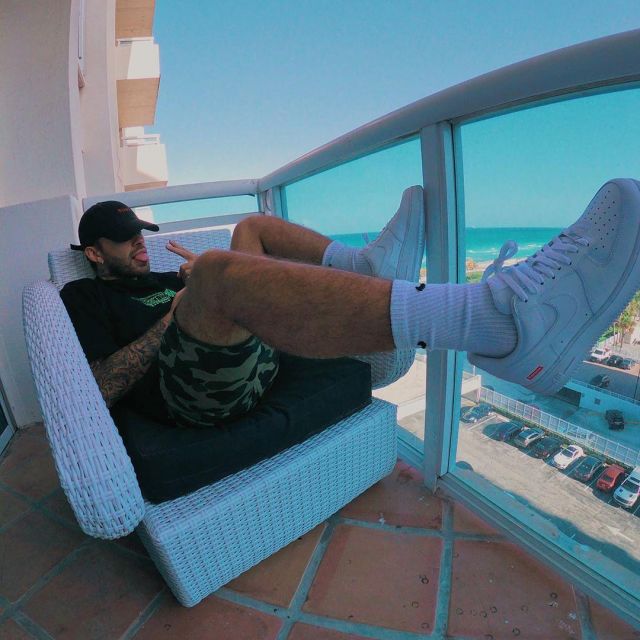 Nike Air Force One x Supreme sneakers worn by Feid on his Instagram account @feid