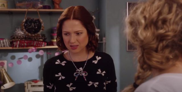 Black top with white bow worn by Kimmy Schmidt (Ellie Kemper) in Unbreakable Kimmy Schmidt: Kimmy vs. the Reverend