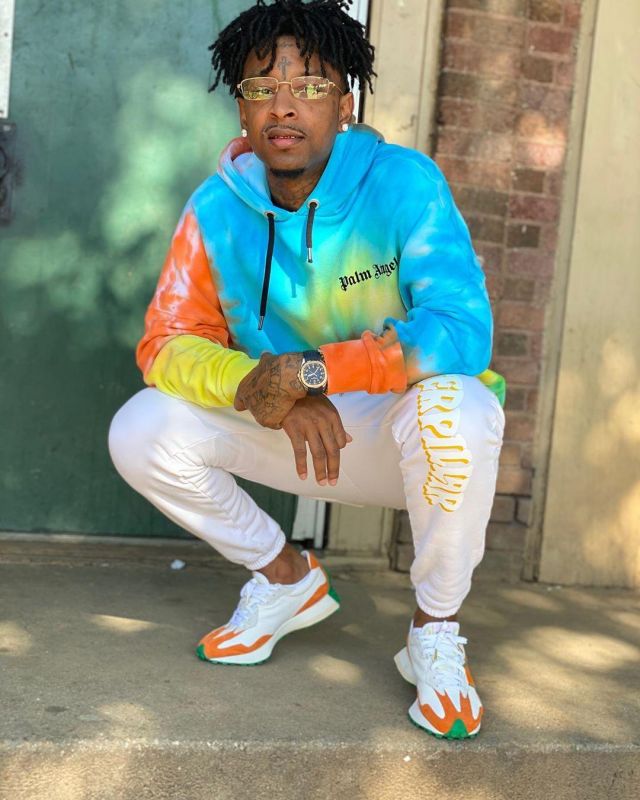 New Balance 327 Casablan­ca Or­ange sneakers worn by 21 Savage on his Instagram account @21savage