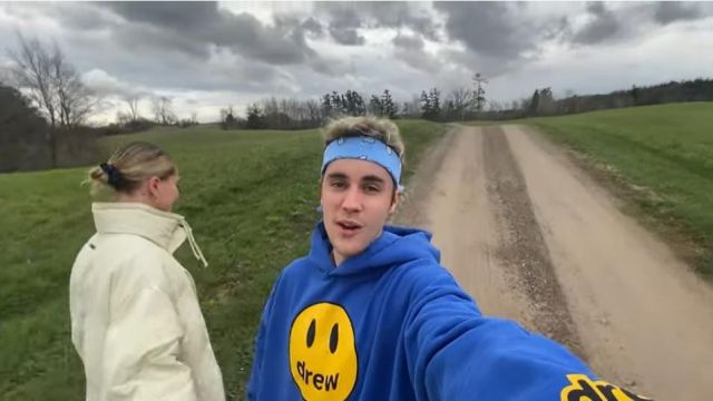 Drew House Blue Hoodie worn by Justin Bieber in Stuck with U (Official Music Video) by Ariana Grande & Justin Bieber