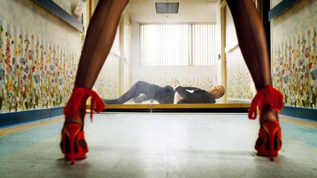 The high-heeled shoes with red bow worn by Lola (Kate Nauta) in The Transporter 2