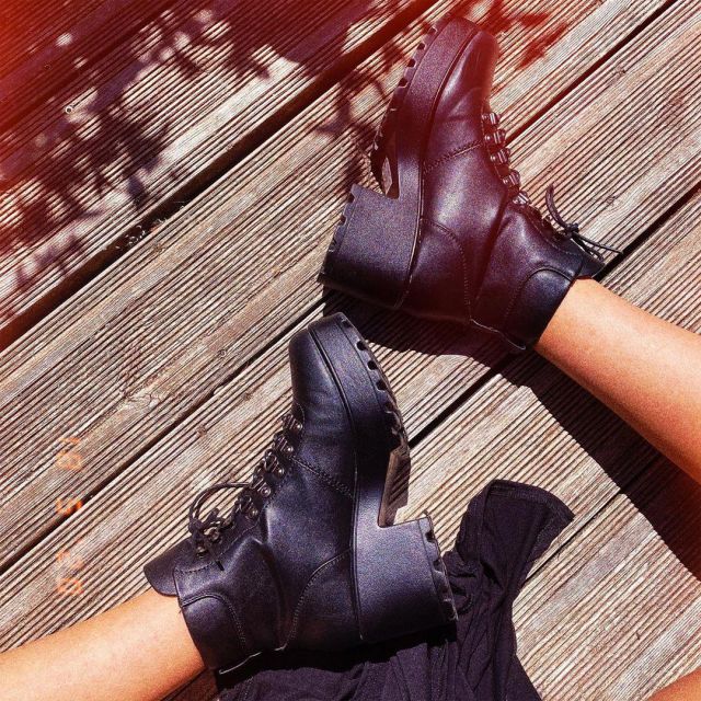 The black boots worn by Horia on his account Instagram @horia_insta