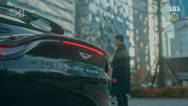 The car Aston Martin DBX color black led by Myeong Na Ri (Kim Yong-ji) in The King : Youngwonui Gunjoo (S01E08)