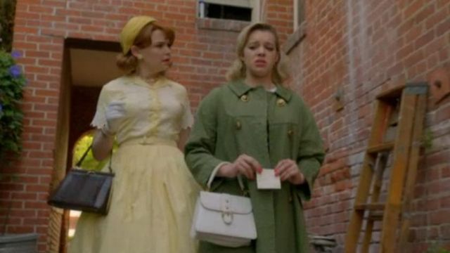 Long green coat worn by April Warner (Sadie Calvano) in Why Women Kill (S01E08)
