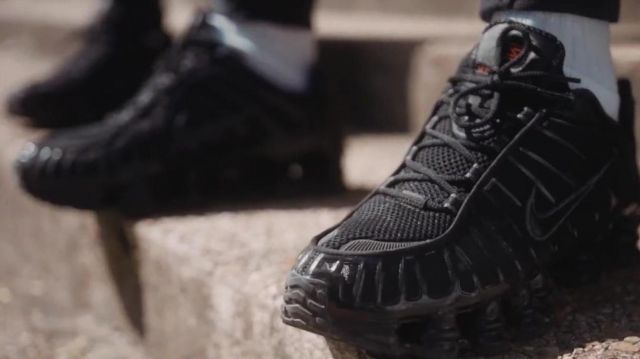 The pair of Nike Shox TL carried by a member of the L2B Gang in the movie clip Betrayal