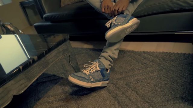 Sneakers Louis Vuitton Trainer Denim Monogram worn by Rich the Kid in the  clip Racks On feat. YoungBoy Never Broke Again