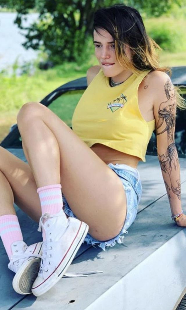 Pink and white Skate tube socks worn by Bella Thorne on Instagram