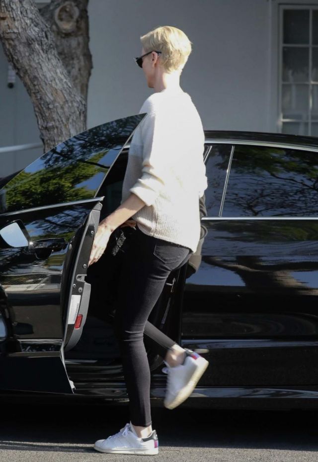 Stella McCartney x Adidas Stan Smith sneakers worn by Charlize Theron