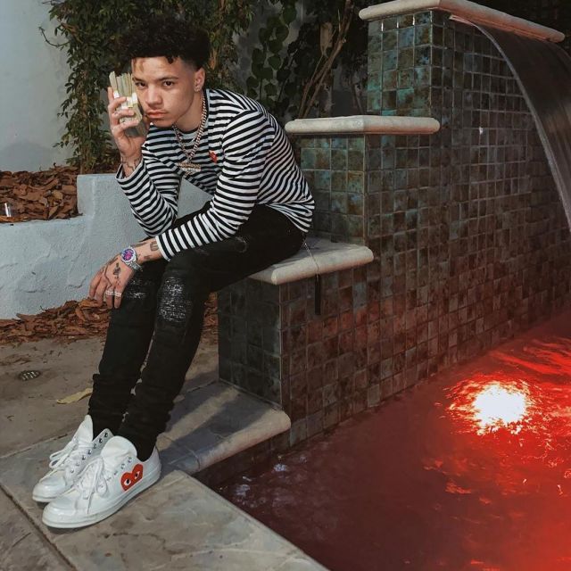 the sneakers comme des Garcons Play x Converse Chuck Taylor 1970s Ox worn by Lil Mosey on his account Instagram @lilmosey