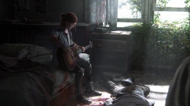 The holding of Ellie Ashley Johnson in The Last of Us Part II 